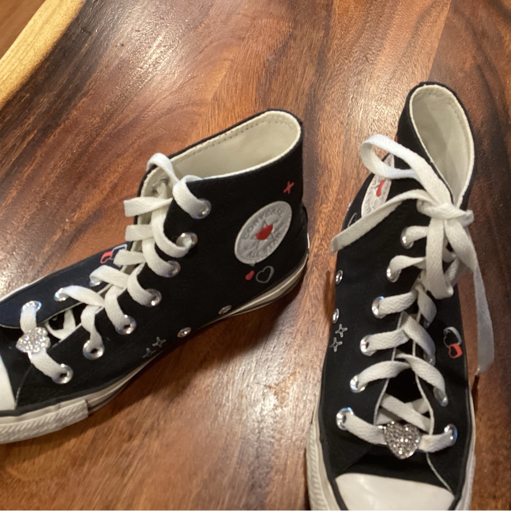 Converse All Star hightop sneakers.